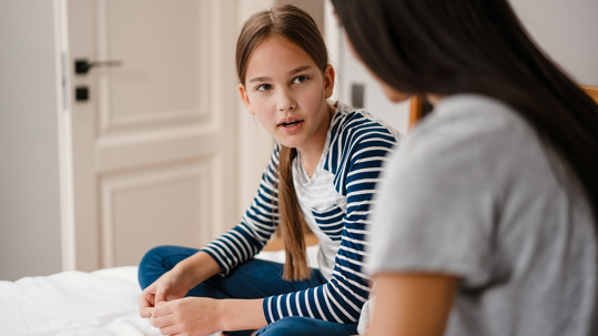 Mother talking to Young-Teenage Daughter